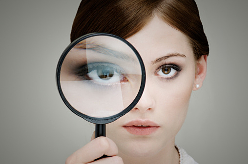 girl with magnifying glass