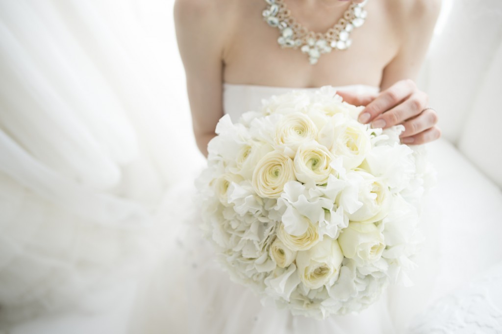 Bride you are touching the bouquet