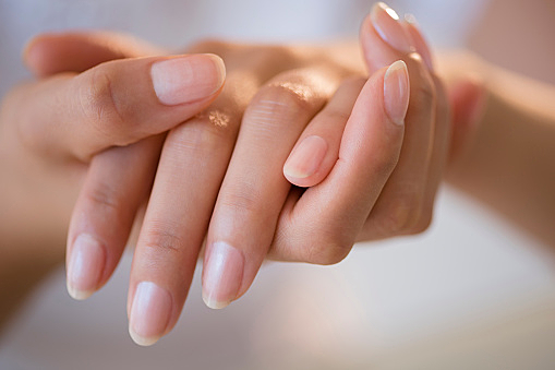Close up of hands of Hispanic woman